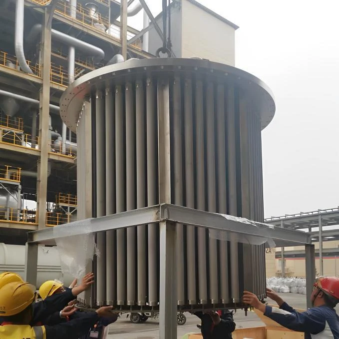 Installazione di elementi a candela in polvere sinterizzata nell'industria del vetro