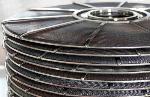 Pacco di dischi filtranti a foglia per polimeri